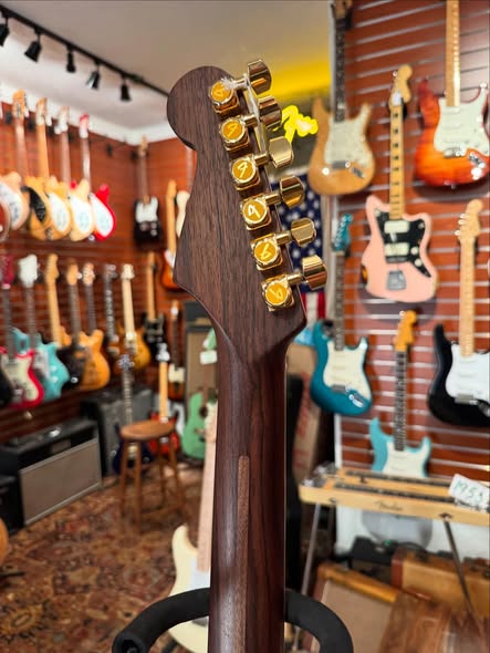 Fender Rarities Stratocaster Dark Walnut over Flame Maple Top at Redwoods vintage Guitars St Pete Florida Headstock Fender Rarities Stratocaster Dark Walnut over Flame Maple Top at Redwoods vintage Guitars St Pete Florida