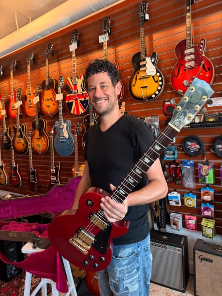 Jason Hobert with a Gibson Les Paul at Redwoods Vintage Guitars St Pete Florida
