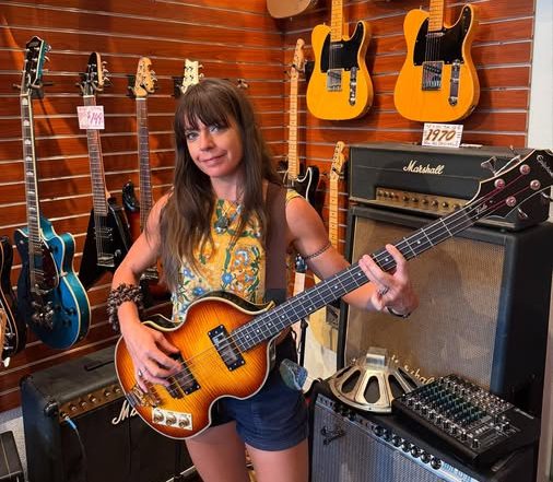 Kate Bradshaw and a Epiphone Viola Bass at Redwoods Vintage Guitars St Pete Florida