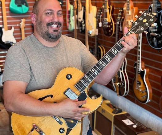 Larue Nickelson with a 1980 Gibson 175 at Redwoods Vintage Guitars