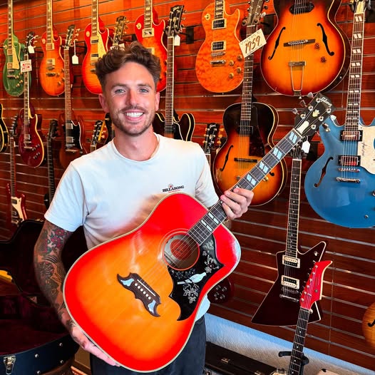 Sam Hastings and a 1960 Gibson Custom Dove Limited Edition at Redwoods Vintage Guitars St Pete Florida